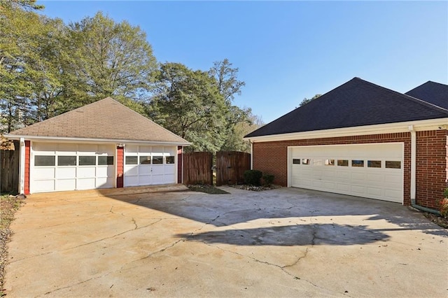 view of front of house with a garage and a front yard