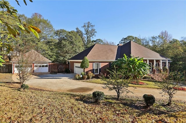 view of front of house with a porch and a front yard