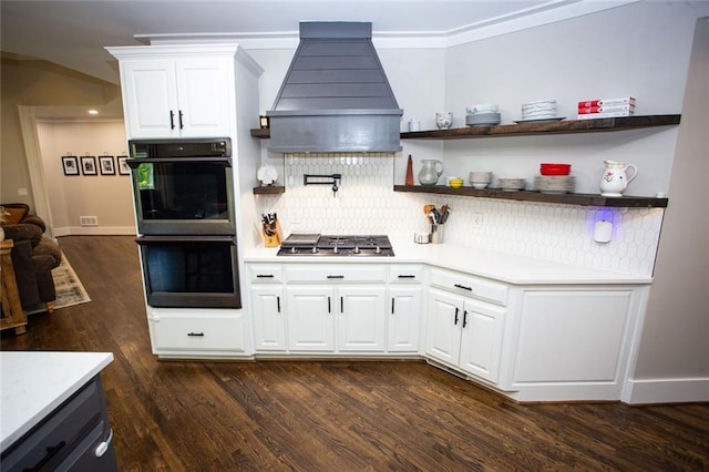 200 Carney Ct, Ball Ground, GA 30107 - kitchen with dark wood-style flooring, light countertops, dobule oven black, tasteful backsplash, and custom exhaust hood