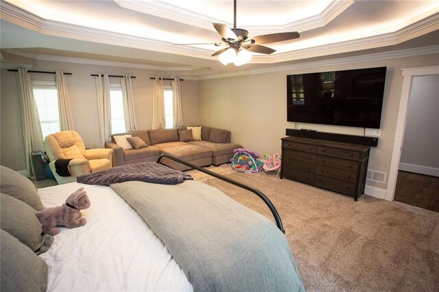 200 Carney Ct, Ball Ground, GA 30107 - carpeted bedroom featuring visible vents, ornamental molding, and a tray ceiling