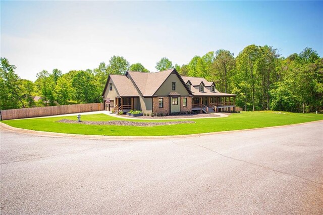 200 Carney Ct, Ball Ground, GA 30107 - view of front facade with a front lawn and fence