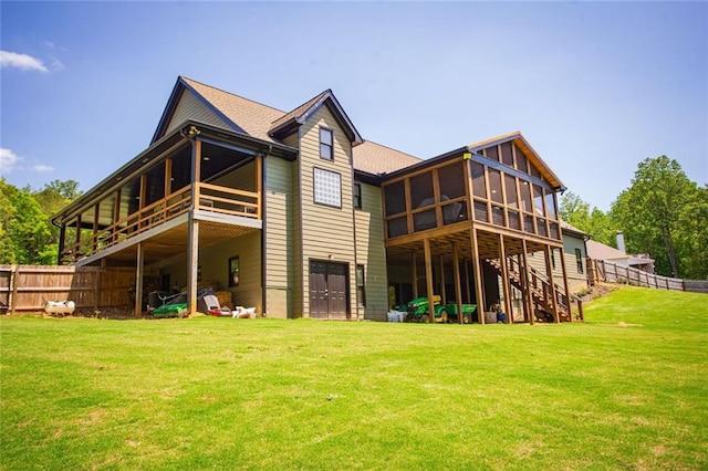 200 Carney Ct, Ball Ground, GA 30107 - rear view of house featuring a yard, fence, stairs, and a sunroom