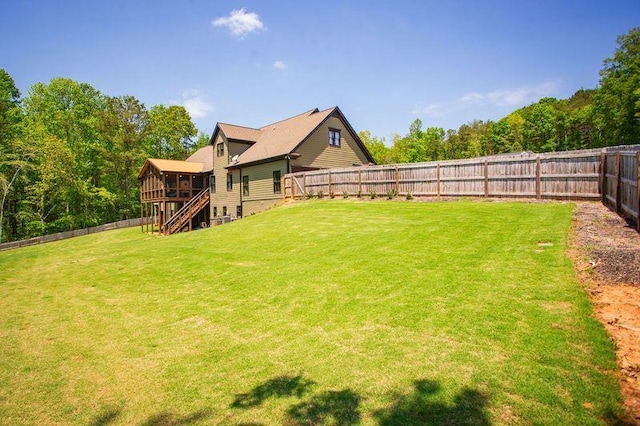 200 Carney Ct, Ball Ground, GA 30107 - view of yard featuring a sunroom, a fenced backyard, and stairs