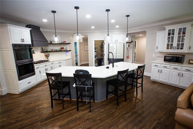 200 Carney Ct, Ball Ground, GA 30107 - kitchen featuring a kitchen breakfast bar, stainless steel microwave, custom exhaust hood, and dobule oven black