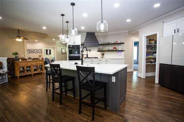 200 Carney Ct, Ball Ground, GA 30107 - kitchen featuring ceiling fan, premium range hood, multiple ovens, light countertops, and white cabinets