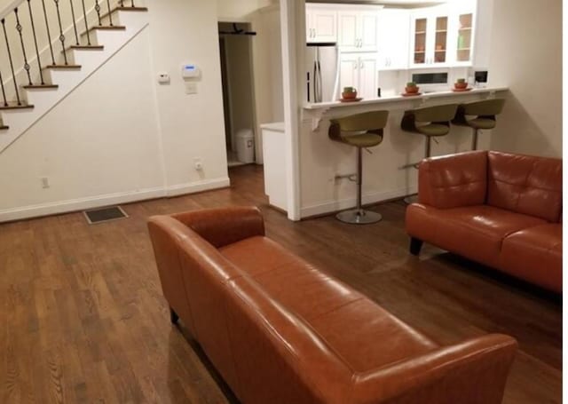 living room featuring wood-type flooring