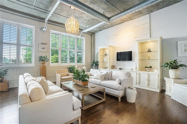 3235 Roswell Rd NE Unit 402, Atlanta, GA 30305 - living room with dark wood-style floors and a towering ceiling