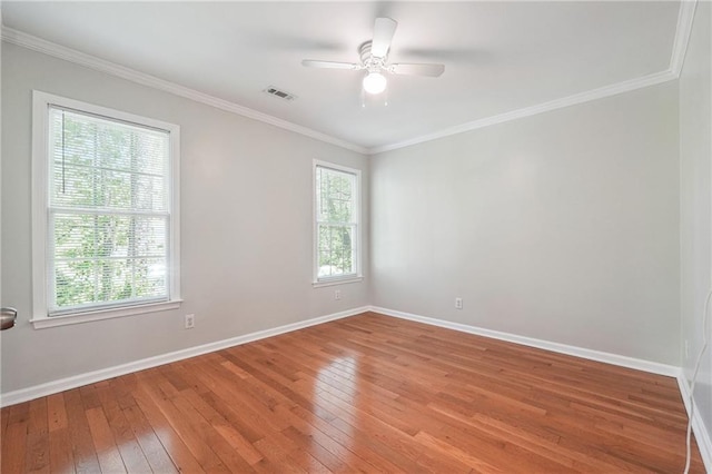 unfurnished room with light wood-type flooring, baseboards, visible vents, and ceiling fan