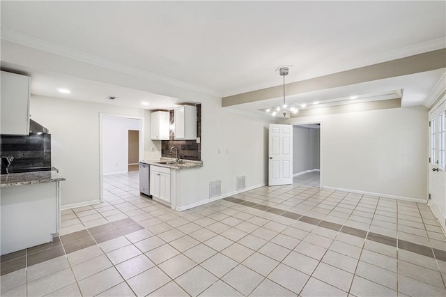 kitchen featuring stainless steel dishwasher, a sink, light tile patterned floors, white cabinetry, and ornamental molding