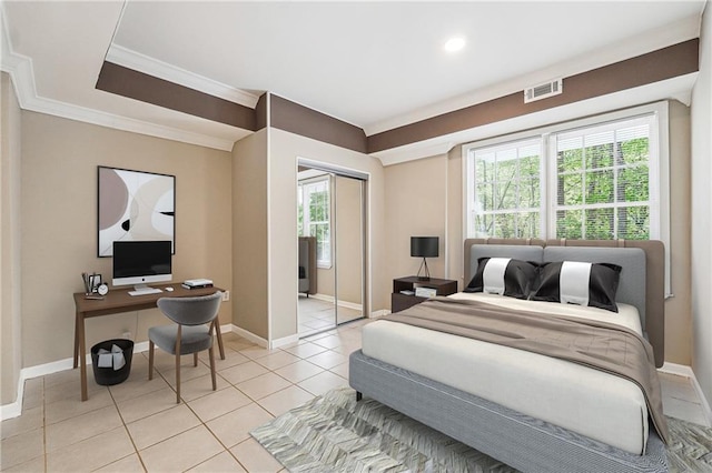 bedroom with visible vents, baseboards, and ornamental molding