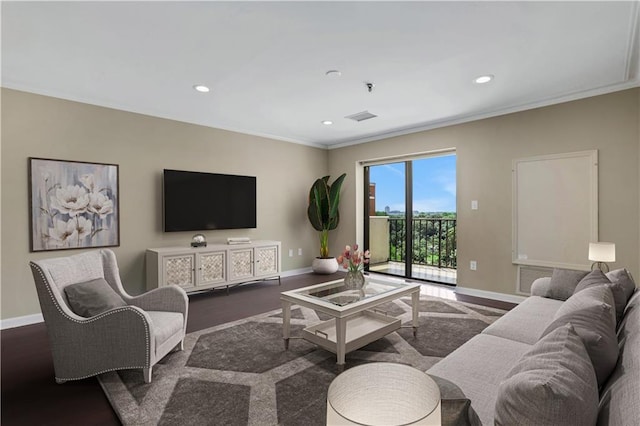 living room with ornamental molding