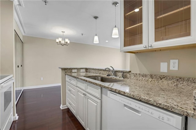 kitchen with crown molding, dishwasher, white cabinetry, sink, and dark hardwood / wood-style floors