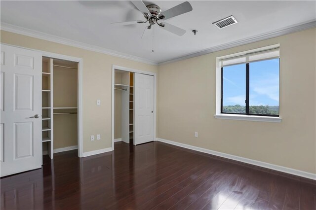 unfurnished bedroom with ceiling fan, crown molding, and wood-type flooring