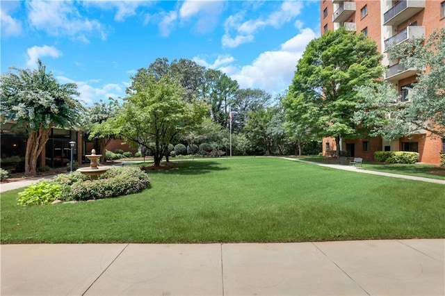 view of yard featuring a balcony