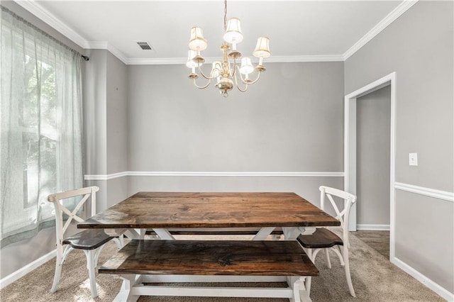dining area with light carpet, ornamental molding, a chandelier, and baseboards