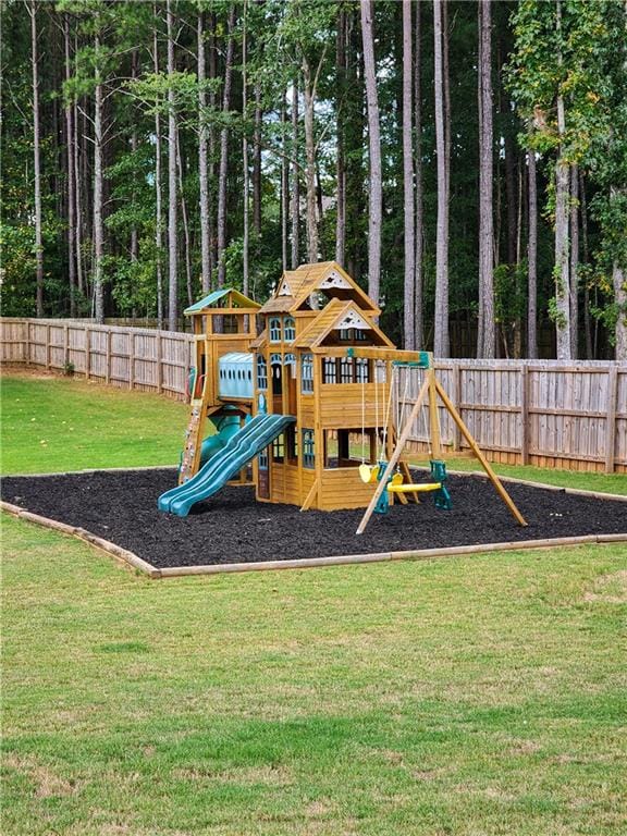 view of playground with a yard