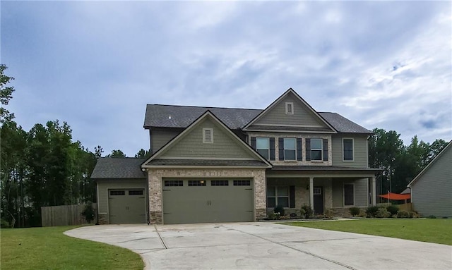 craftsman house featuring a front lawn