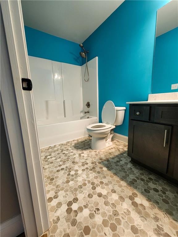 full bathroom with vanity, toilet, and bathtub / shower combination