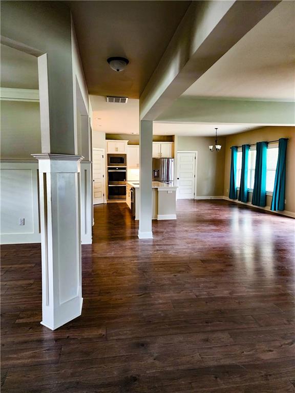 interior space with dark wood-type flooring