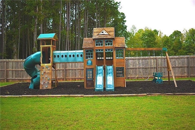 view of playground with a lawn