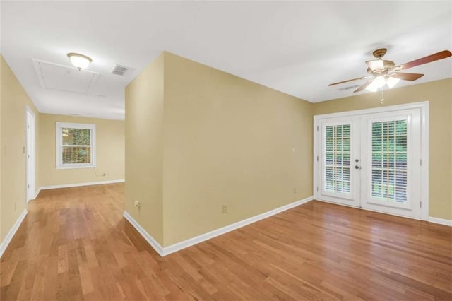 280 W Knight Rd W, Mcdonough, GA 30252 - empty room featuring french doors, ceiling fan, and light wood finished floors