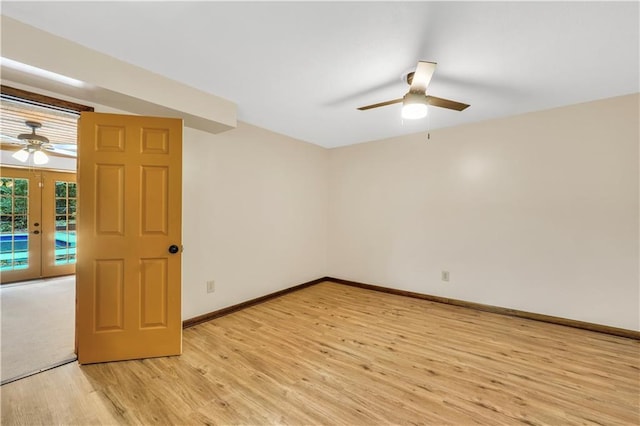 280 W Knight Rd W, Mcdonough, GA 30252 - unfurnished room featuring a ceiling fan, french doors, and light wood finished floors