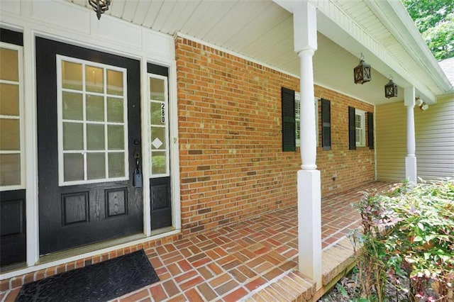 280 W Knight Rd W, Mcdonough, GA 30252 - doorway to property with covered porch and brick siding