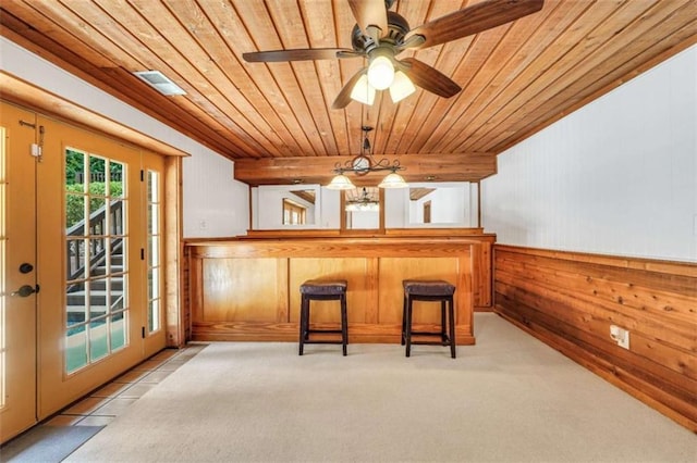 280 W Knight Rd W, Mcdonough, GA 30252 - unfurnished dining area with wood ceiling, wood walls, a chandelier, carpet floors, and a ceiling fan