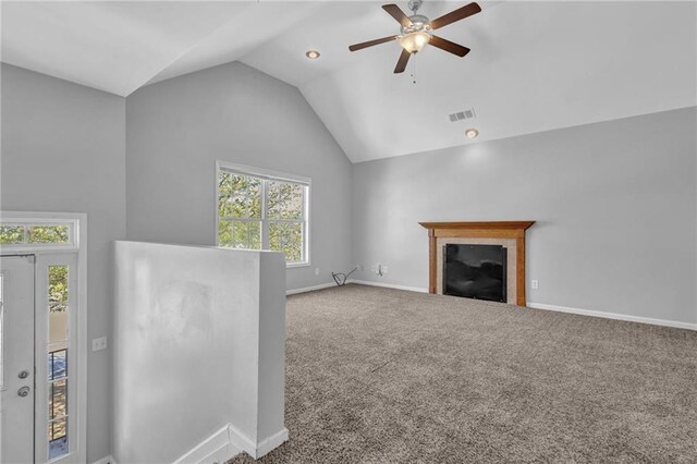 2551 Tolliver Dr, Ellenwood, GA 30294 - unfurnished living room featuring visible vents, lofted ceiling, carpet floors, baseboards, and ceiling fan