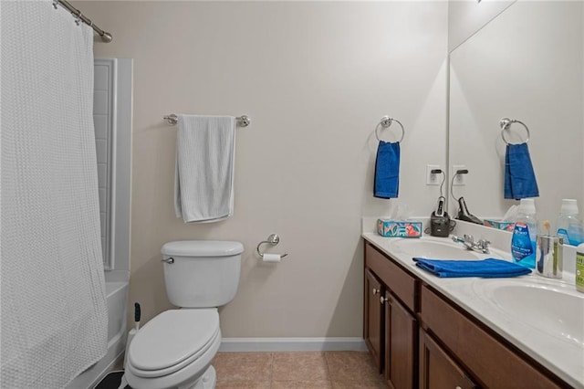 full bathroom featuring vanity, shower / bathtub combination with curtain, toilet, and tile patterned floors