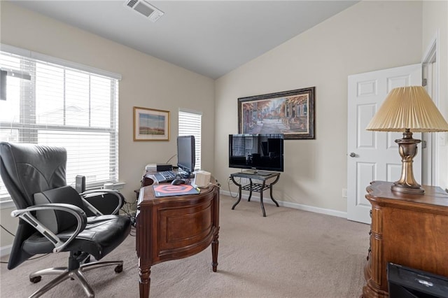 office with light carpet, vaulted ceiling, and baseboards