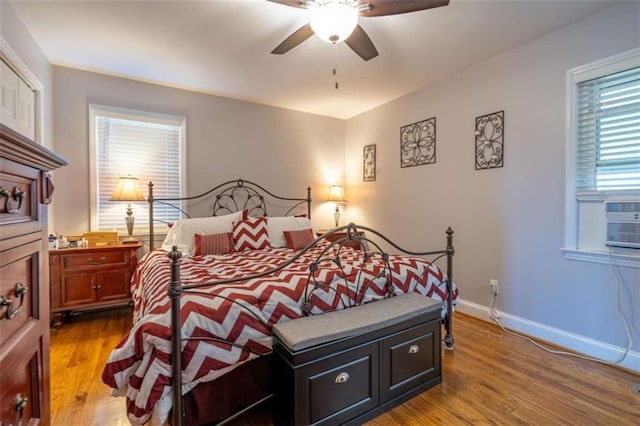 bedroom featuring ceiling fan and wood-type flooring