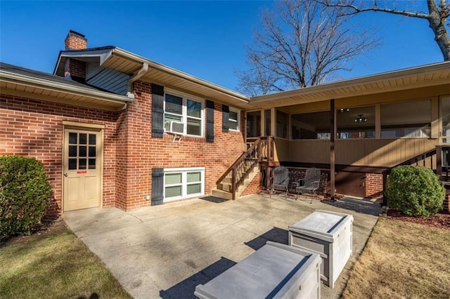 back of house with a patio area