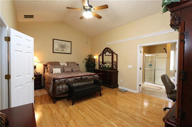 bedroom featuring light wood-type flooring, ceiling fan, and vaulted ceiling