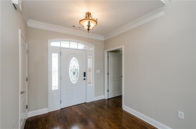 entryway featuring crown molding, dark wood-style flooring, and baseboards