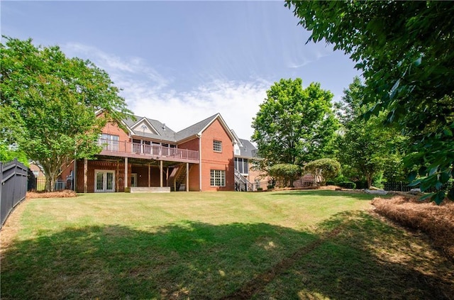 rear view of house featuring french doors, stairs, and a deck