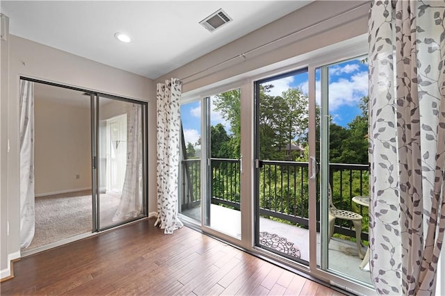 1312 Pine Heights Dr NE, Atlanta, GA 30324 - entryway featuring wood finished floors, baseboards, and recessed lighting