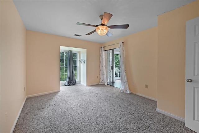 1312 Pine Heights Dr NE, Atlanta, GA 30324 - empty room featuring ceiling fan, carpet floors, and baseboards