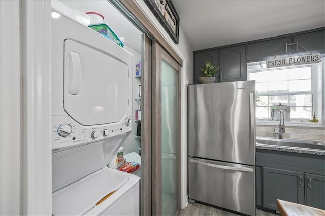 9050 Pine Tree Cir, Gainesville, GA 30506 - laundry room featuring stacked washer and clothes dryer