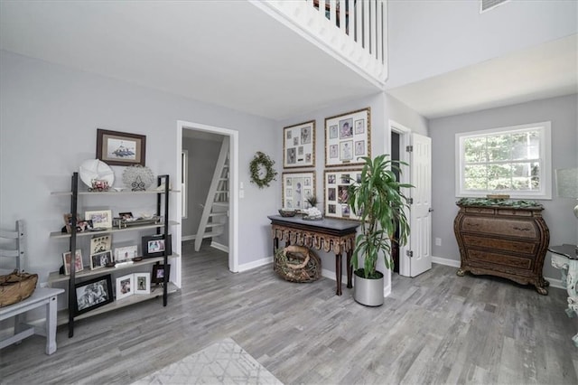 9050 Pine Tree Cir, Gainesville, GA 30506 - entrance foyer with wood finished floors and stairway