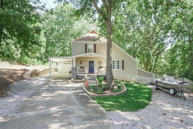 9050 Pine Tree Cir, Gainesville, GA 30506 - view of front facade with a porch, concrete driveway, and a carport