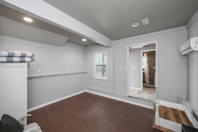9050 Pine Tree Cir, Gainesville, GA 30506 - below grade area featuring a wall mounted air conditioner and recessed lighting