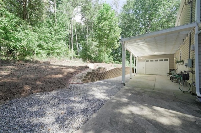 9050 Pine Tree Cir, Gainesville, GA 30506 - view of yard with concrete driveway and a garage