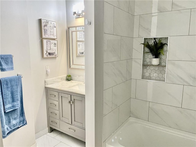 2479 Peachtree Rd NE Unit 105, Atlanta, GA 30305 - full bath featuring vanity, baseboards, and shower / bath combination