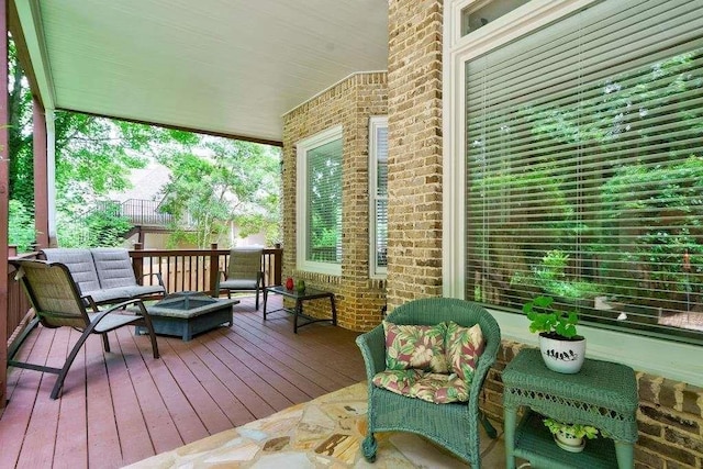 deck featuring a fire pit
