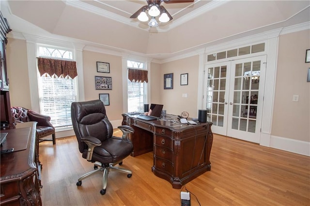 office area featuring ceiling fan, french doors, ornamental molding, and light wood finished floors