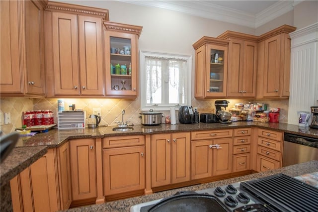 kitchen with stainless steel dishwasher, dark stone counters, ornamental molding, and a sink