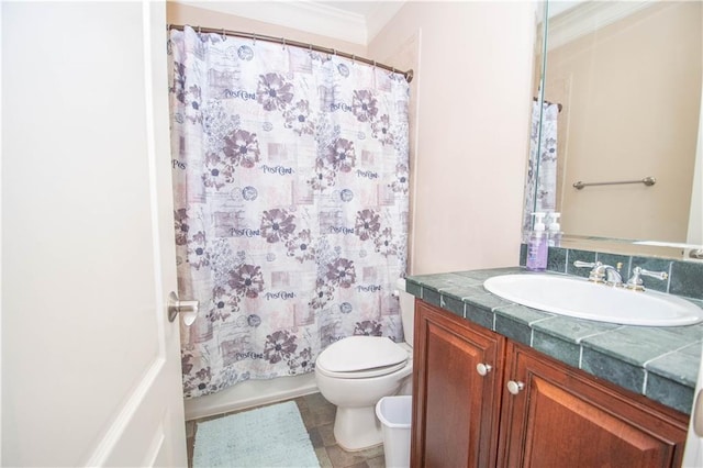 bathroom featuring toilet, shower / bath combo, ornamental molding, tile patterned flooring, and vanity