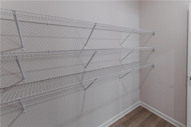 530 River Run Dr, Dallas, GA 30132 - spacious closet with dark wood-style floors