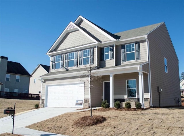 craftsman inspired home with a garage